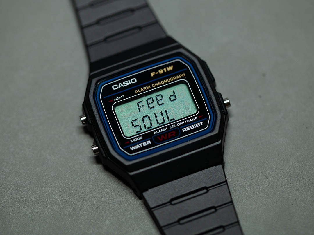 A casio watch showing text: feed soul